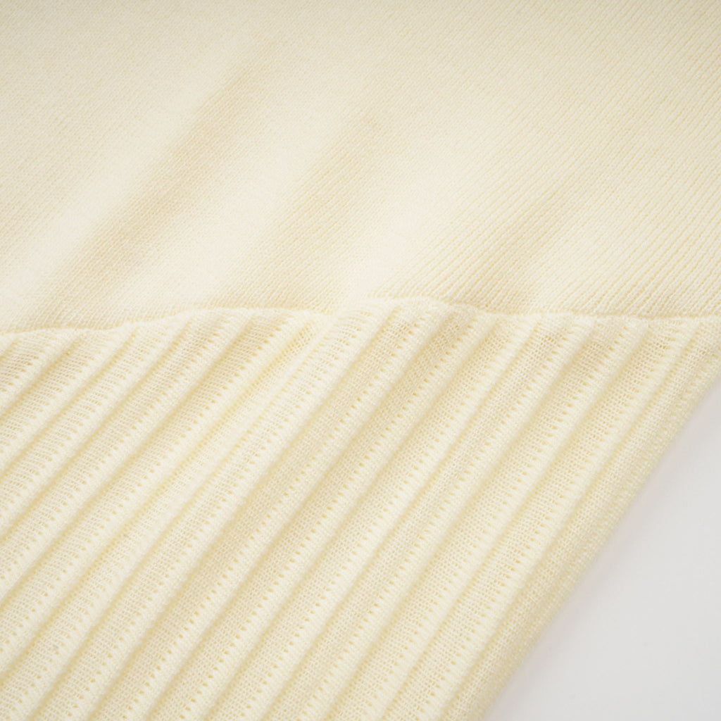 Émeline white knitted pleated midi dress