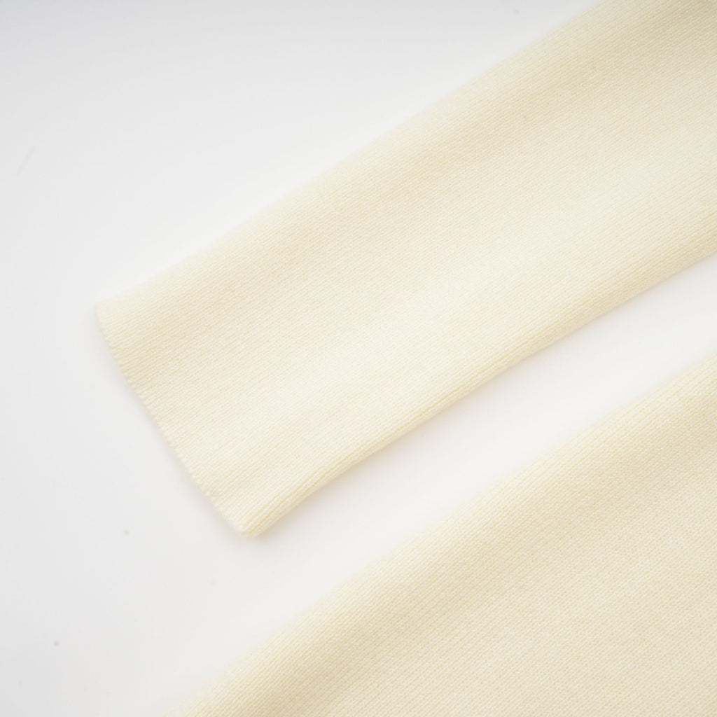 Émeline white knitted pleated midi dress