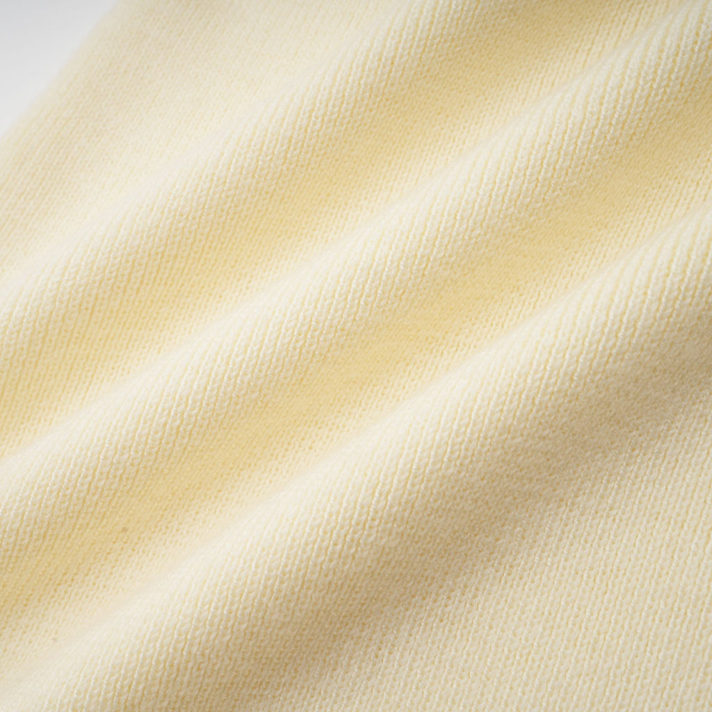 Émeline white knitted pleated midi dress