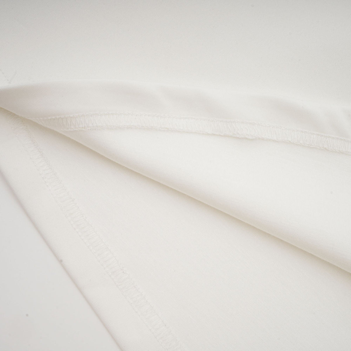 Magali White Sleeveless Maxi Dress with Faux Flower & Bow-Tie Embellishment